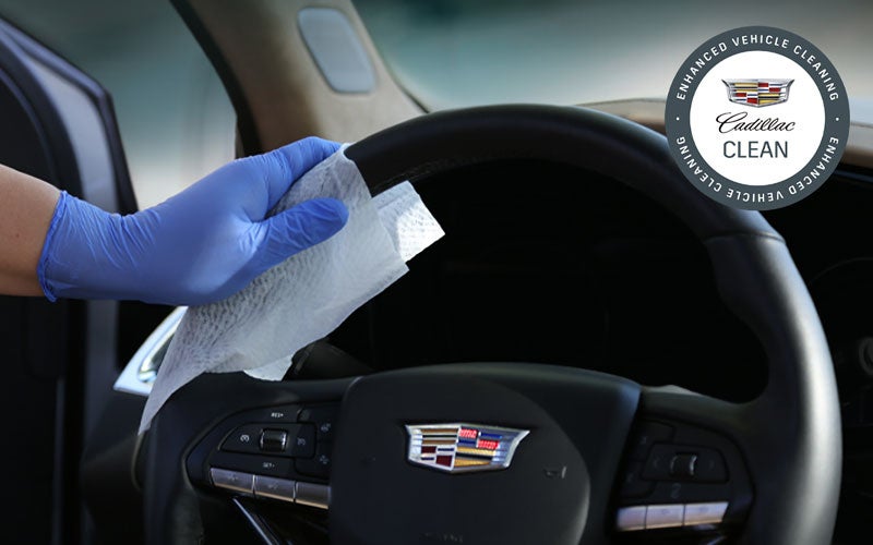 Cadillac steering wheel being cleaned